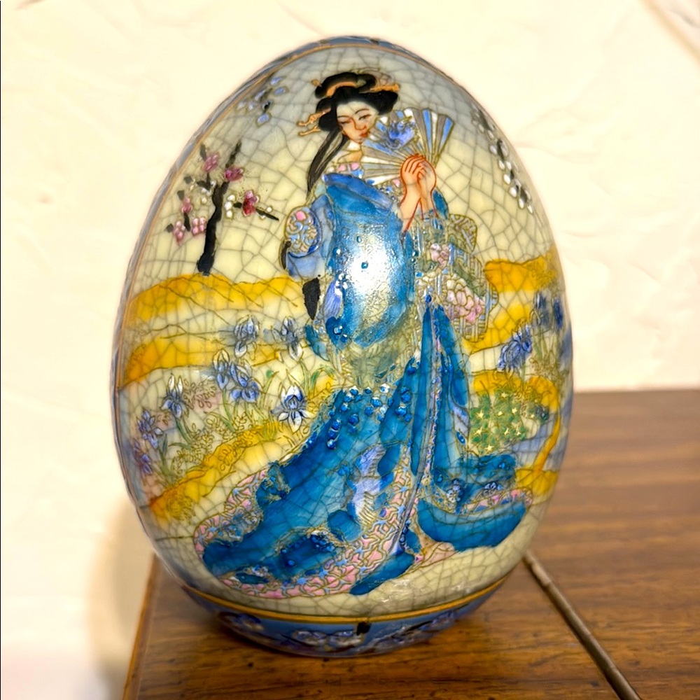 Blue and White Ceramic Egg with Traditional Art
